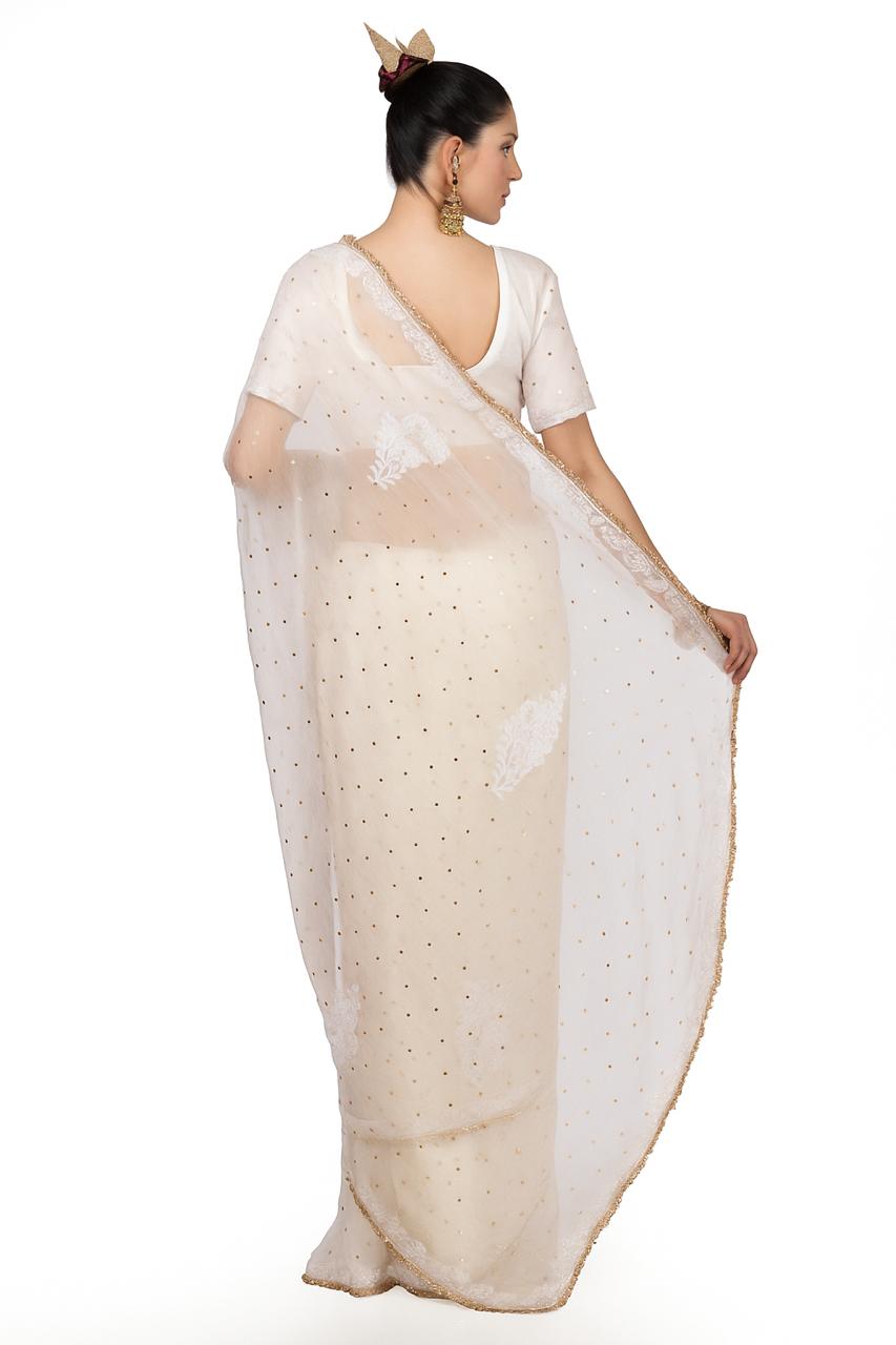 White silk organza, mukaish and Lucknowi hand-embroidered sari finished in Hyderabadi gotta