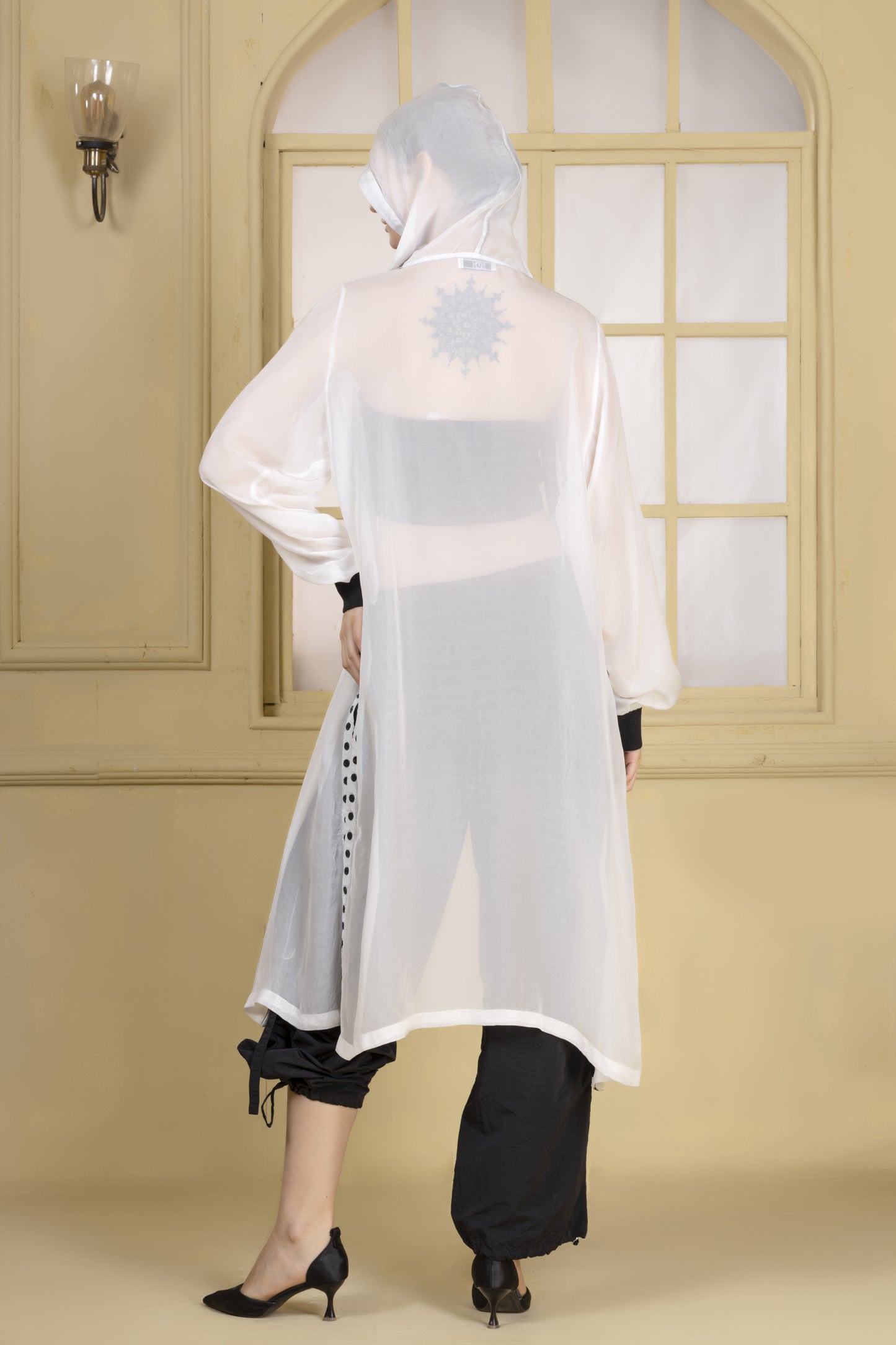 White long organza bomber with hoodie finished in black tape