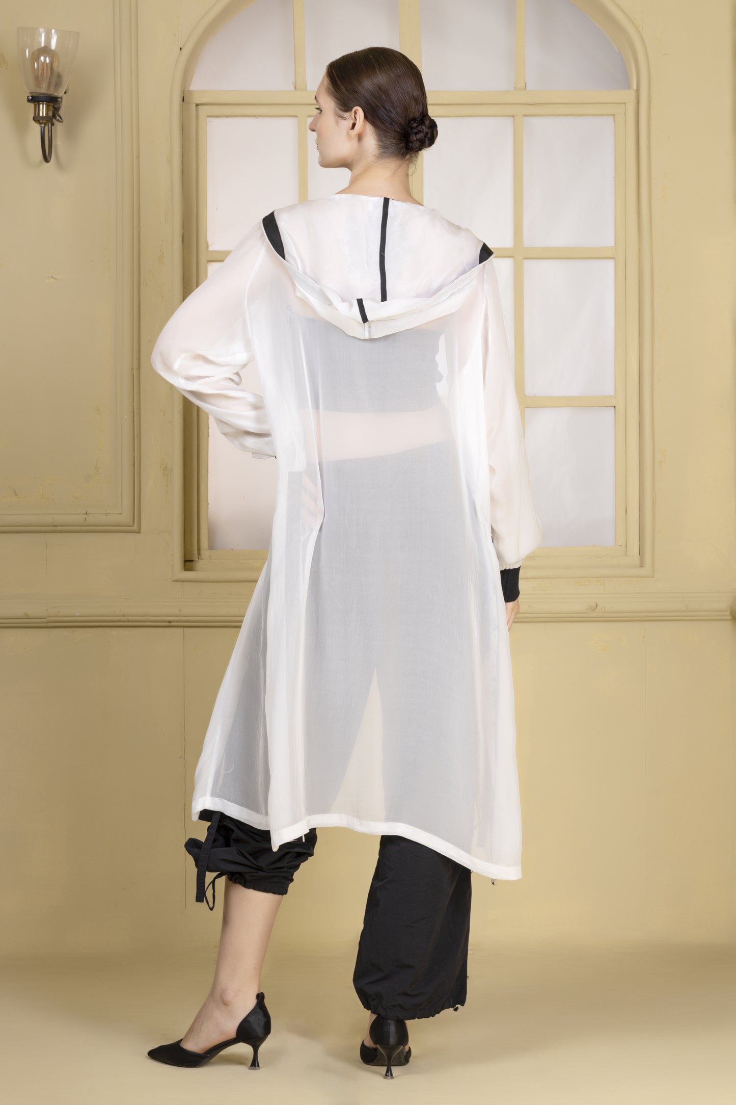 White long organza bomber with hoodie finished in black tape