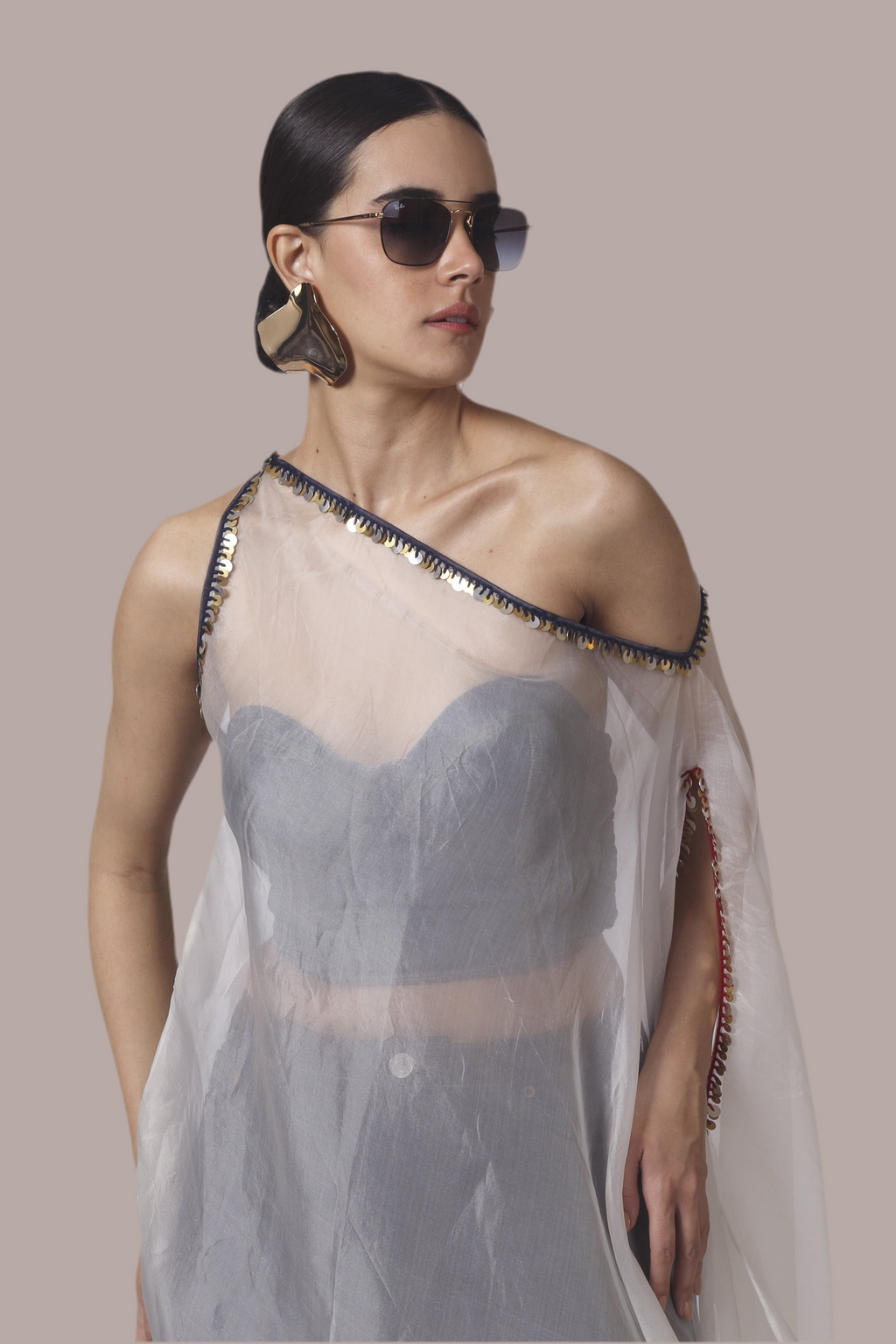 Cream & Navy tie n dye one shoulder organza long top finished in red & Navy embroidery paired with a denim bustier