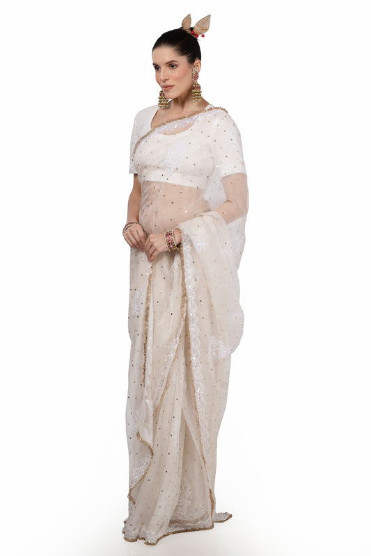 White silk organza, mukaish and Lucknowi hand-embroidered sari finished in Hyderabadi gotta