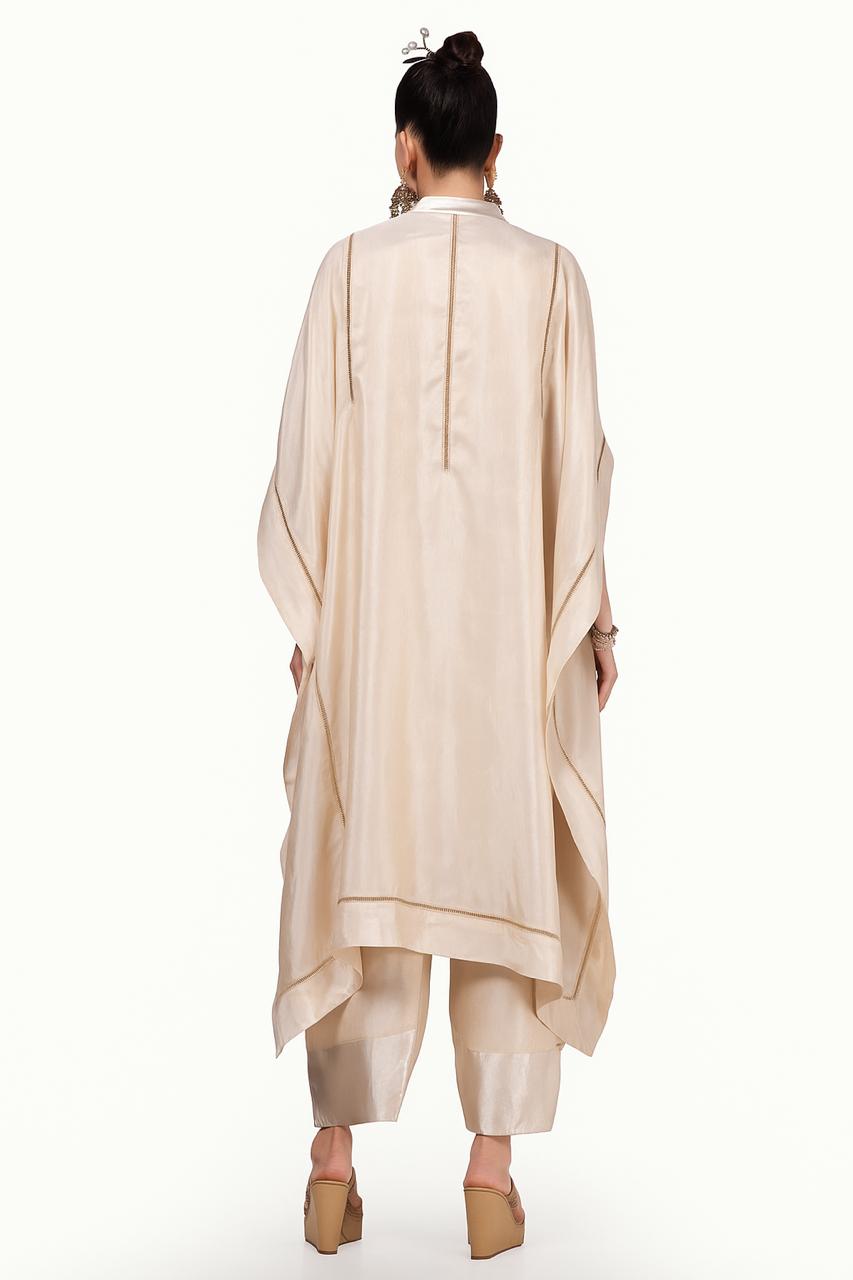 Cream-Gold embroidered top with gold ladder and embroidered motif at yolk