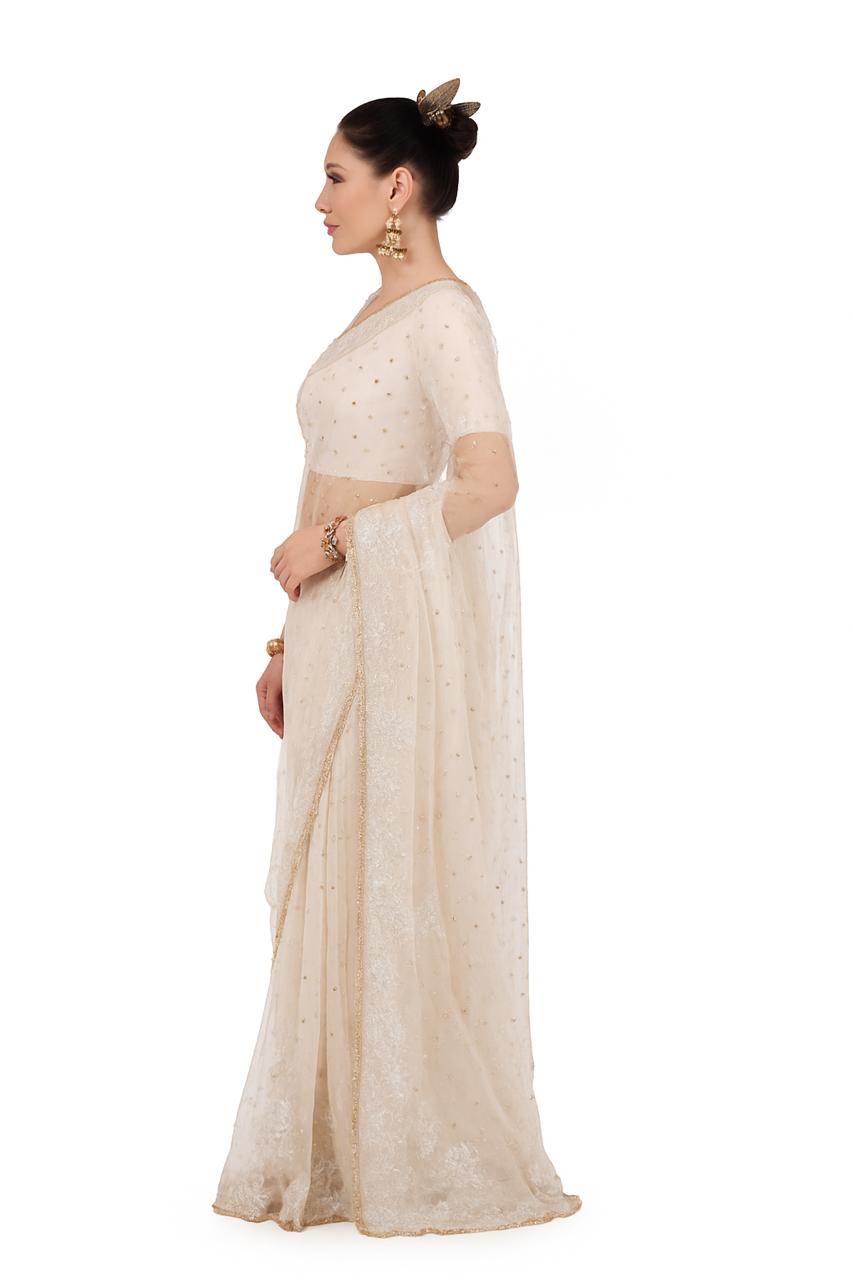 White silk organza, mukaish and Lucknowi hand-embroidered sari finished in Hyderabadi gotta