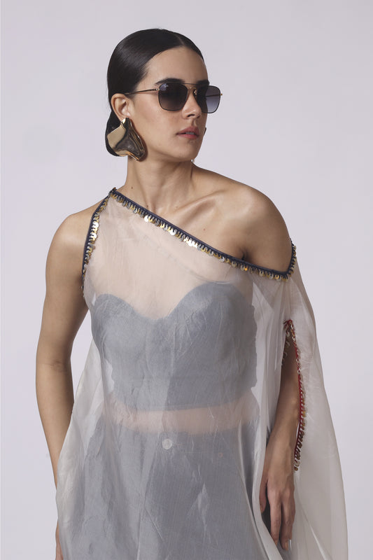 Cream tie n dye one shoulder organza long top paired with a denim bustier